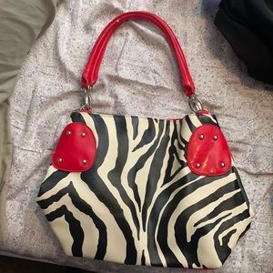 Zebra print red purse